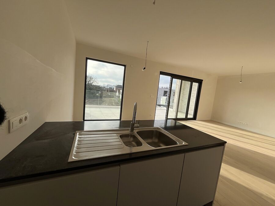 Zonovergoten nieuwbouw appartement + garage