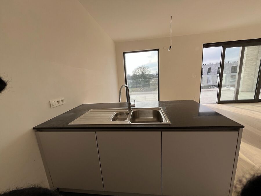 Zonovergoten nieuwbouw appartement + garage