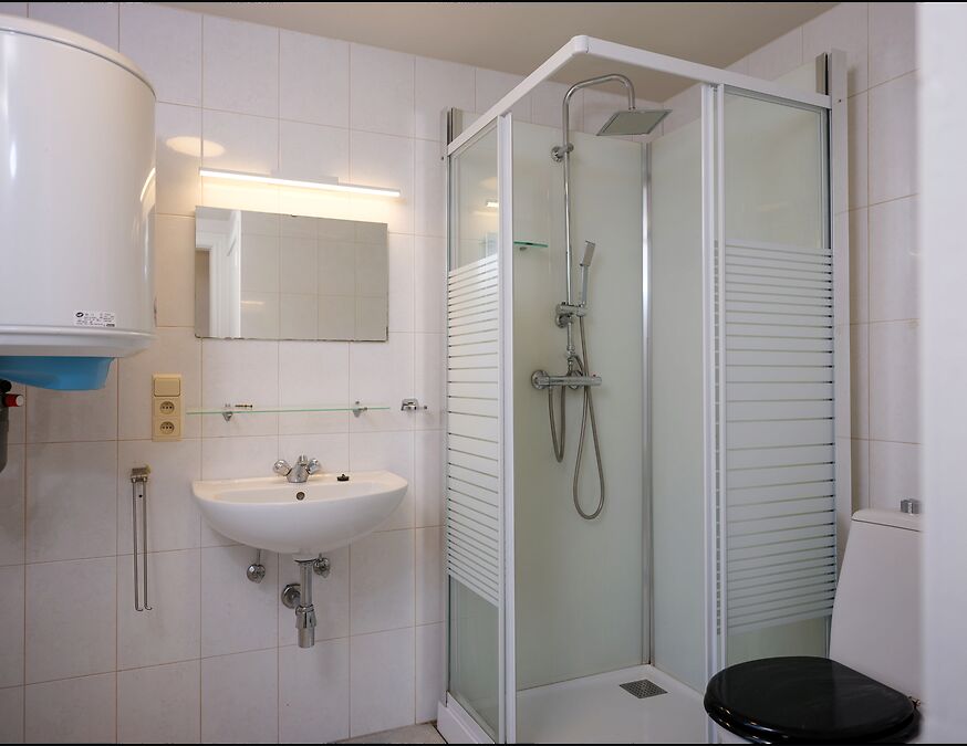 Centraal gelegen kleine rijwoning