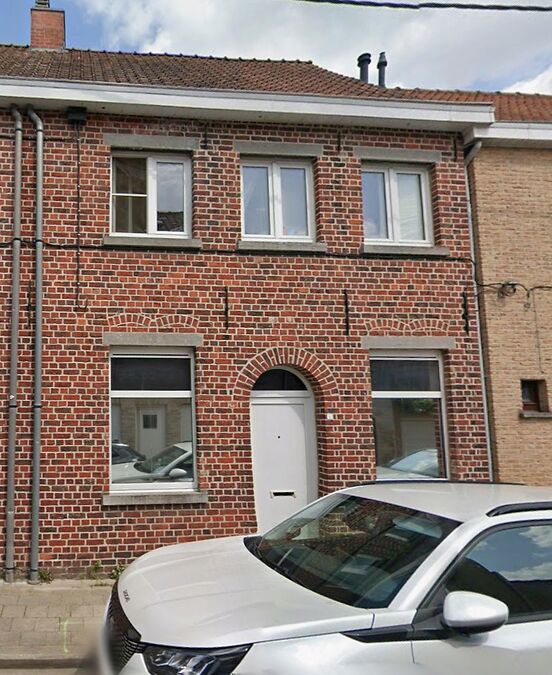 Centraal gelegen kleine rijwoning