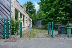 Te renoveren school in het groene Bellem